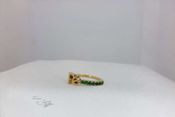 Anillo fe con 8 esmeraldas 55pts