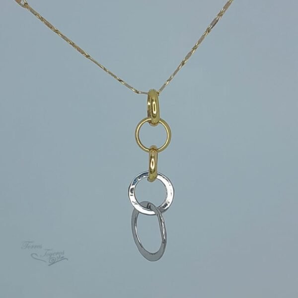 Dije aros en oro blanco y amarillo