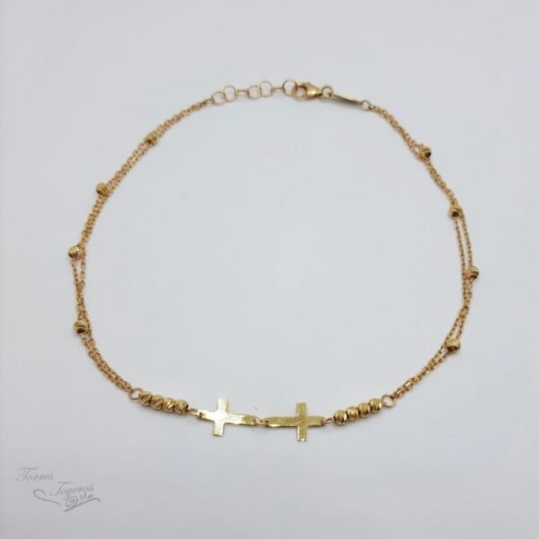 Tobillera oro amarillo con doble cruz